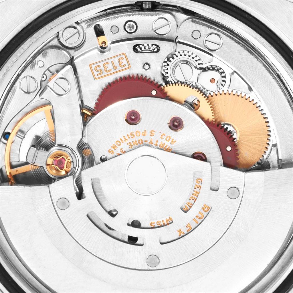 This image shows the internal mechanics of a Rolex Turn-o-Graph 116264 Men's Stainless Steel Blue Dial 116264 Men's Stainless Steel Blue Dial watch at a close-up angle.
