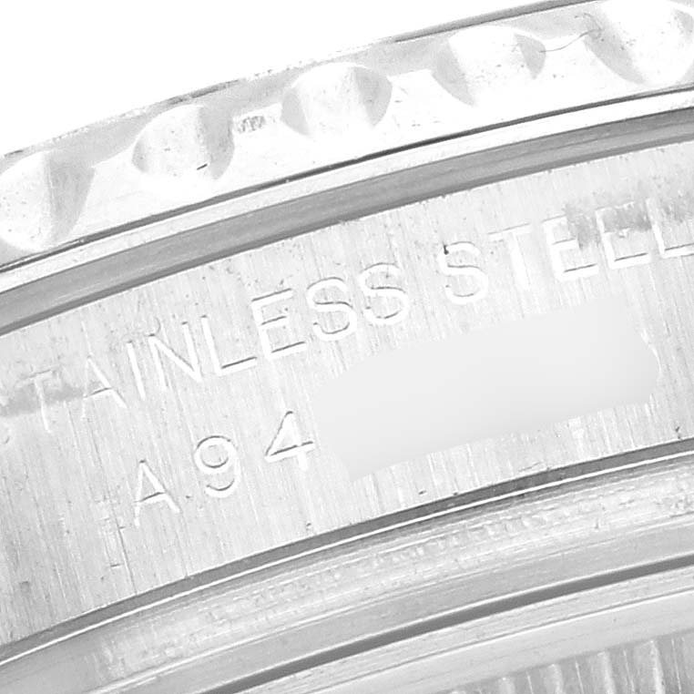 The image shows a close-up of the bezel and part of the case back of a Rolex Yacht-Master 169622 Women's Stainless Steel Silver Dial 169622 Women's Stainless Steel Silver Dial watch.