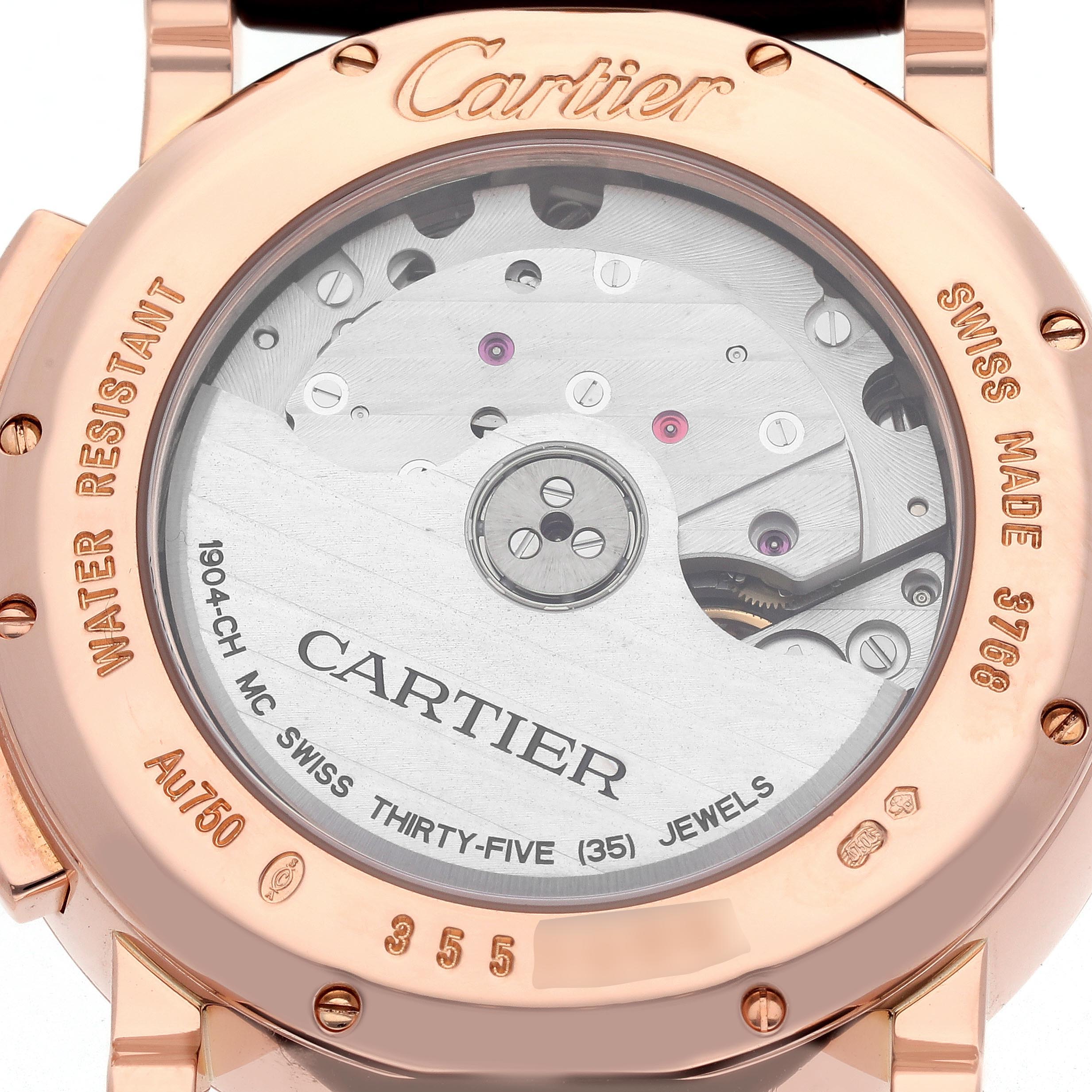 The image shows the back of the Cartier Rotonde W1556238 Men's Rose Gold Silver Dial W1556238 Men's Rose Gold Silver Dial watch, highlighting its mechanism and engraved details.