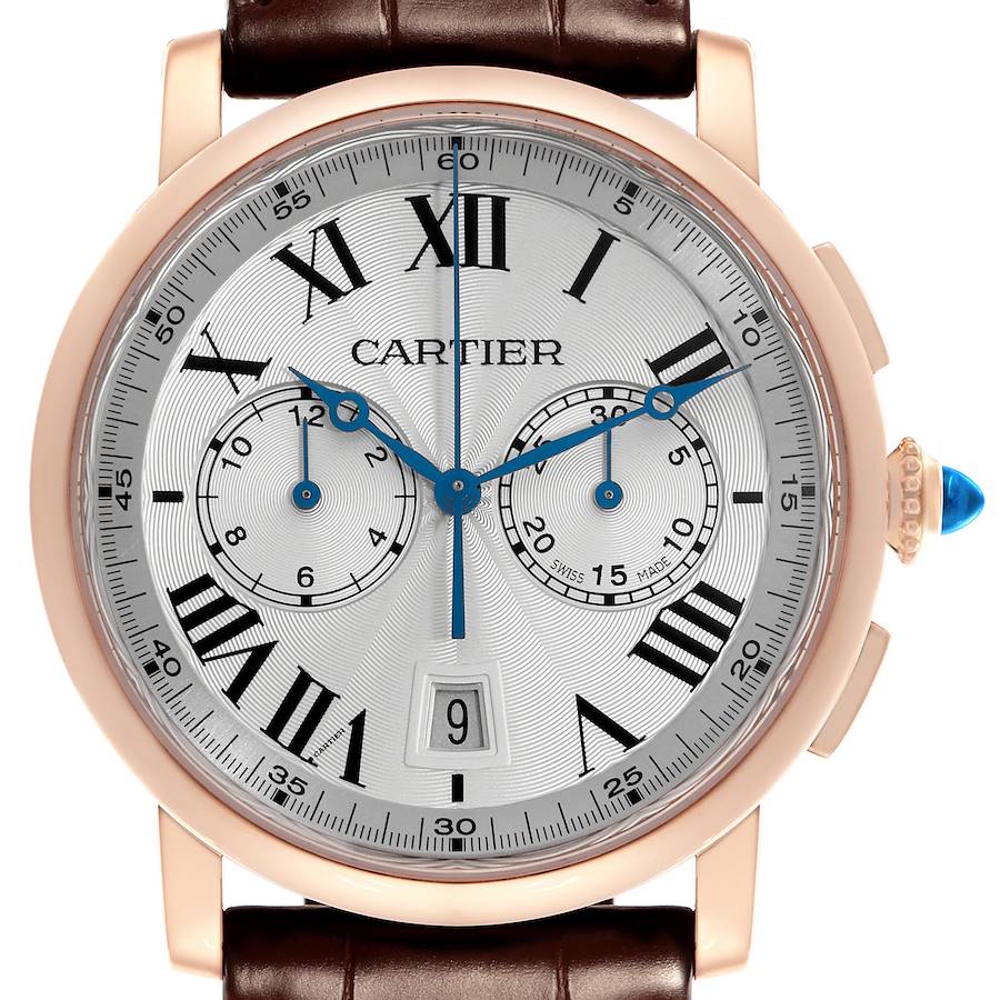 The Cartier Rotonde W1556238 Men's Rose Gold Silver Dial W1556238 Men's Rose Gold Silver Dial watch is shown from the front, highlighting its dial, Roman numerals, subdials, and crown with a blue gem.