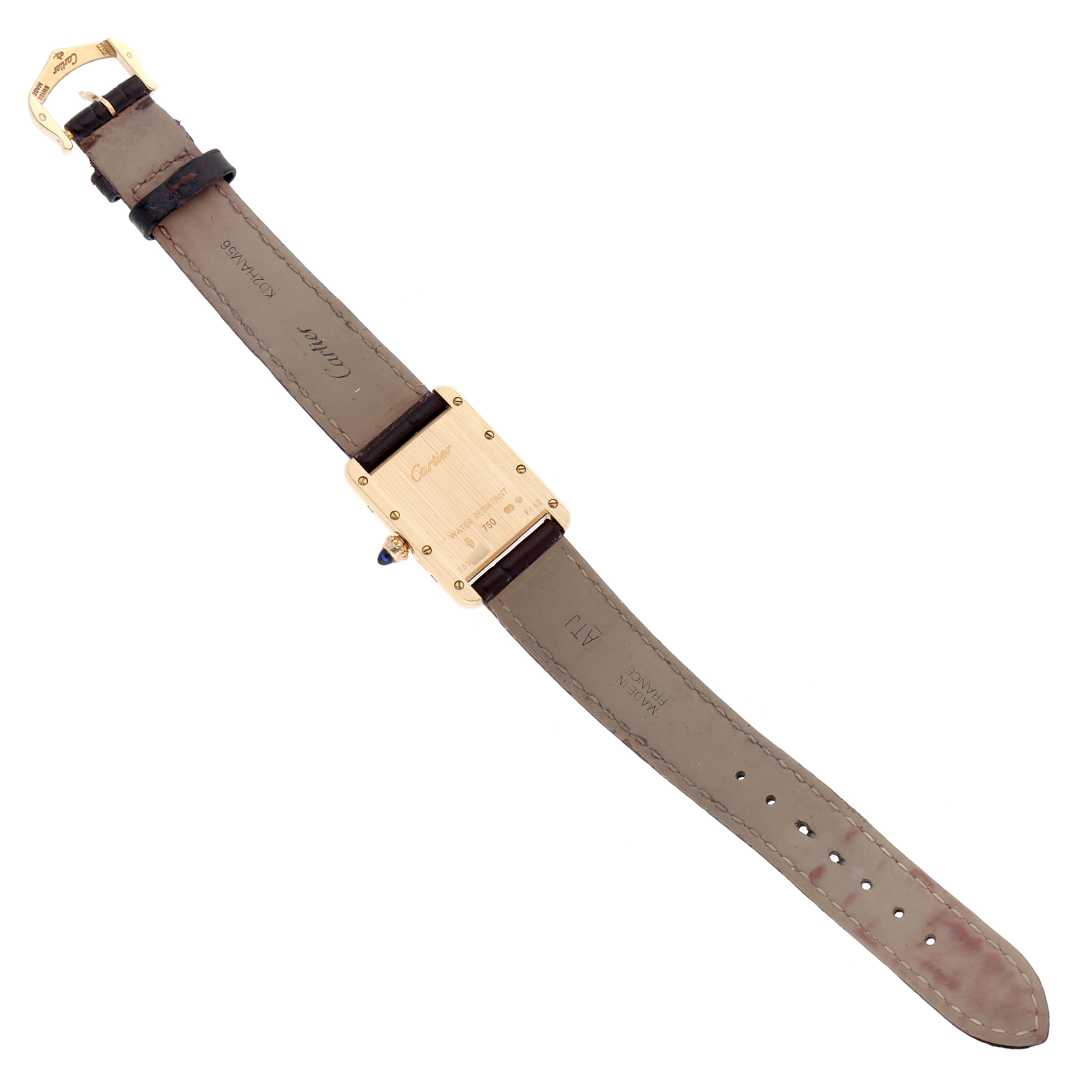 The Cartier Tank Louis W1529856 Women's Yellow Gold Silver Dial W1529856 Women's Yellow Gold Silver Dial model is shown from the back, displaying the case, leather strap, and buckle.