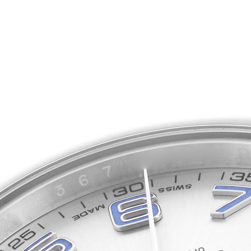 The image shows a close-up of the Rolex Datejust 41 116300 Men's Stainless Steel Silver Dial 116300 Men's Stainless Steel Silver Dial, focusing on the dial with visible hour markers and part of the second hand.