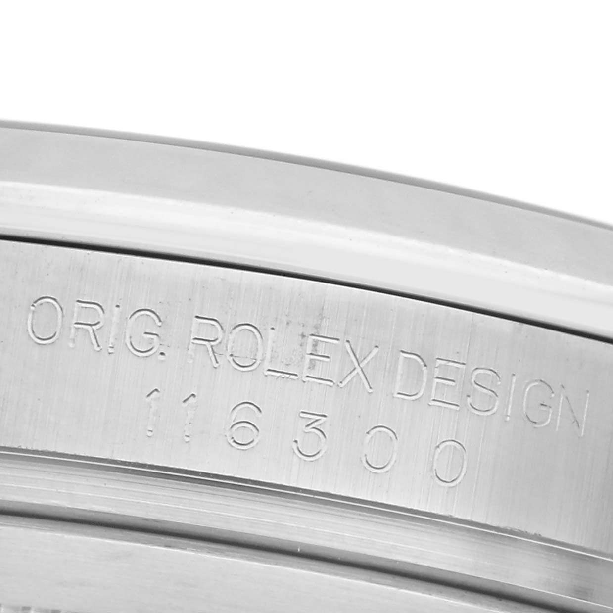 The image shows a close-up of the inner bezel of the Rolex Datejust 41 116300 Men's Stainless Steel Silver Dial 116300 Men's Stainless Steel Silver Dial, displaying the engraved model and brand specifications.