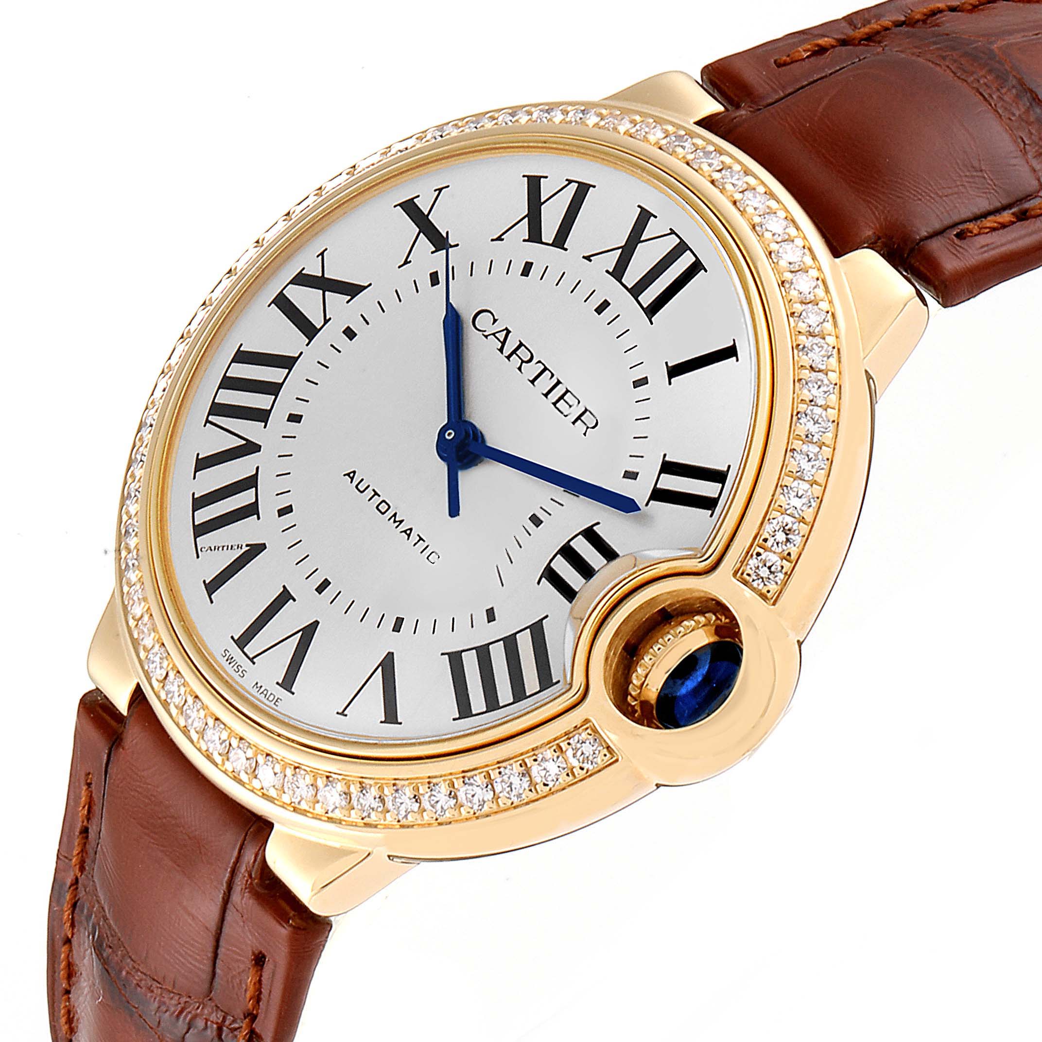 The image shows a close-up, angled view of the Cartier Ballon Bleu WE900451 Women's Yellow Gold Silver Dial WE900451 Women's Yellow Gold Silver Dial watch, highlighting its dial, Roman numerals, and leather strap.
