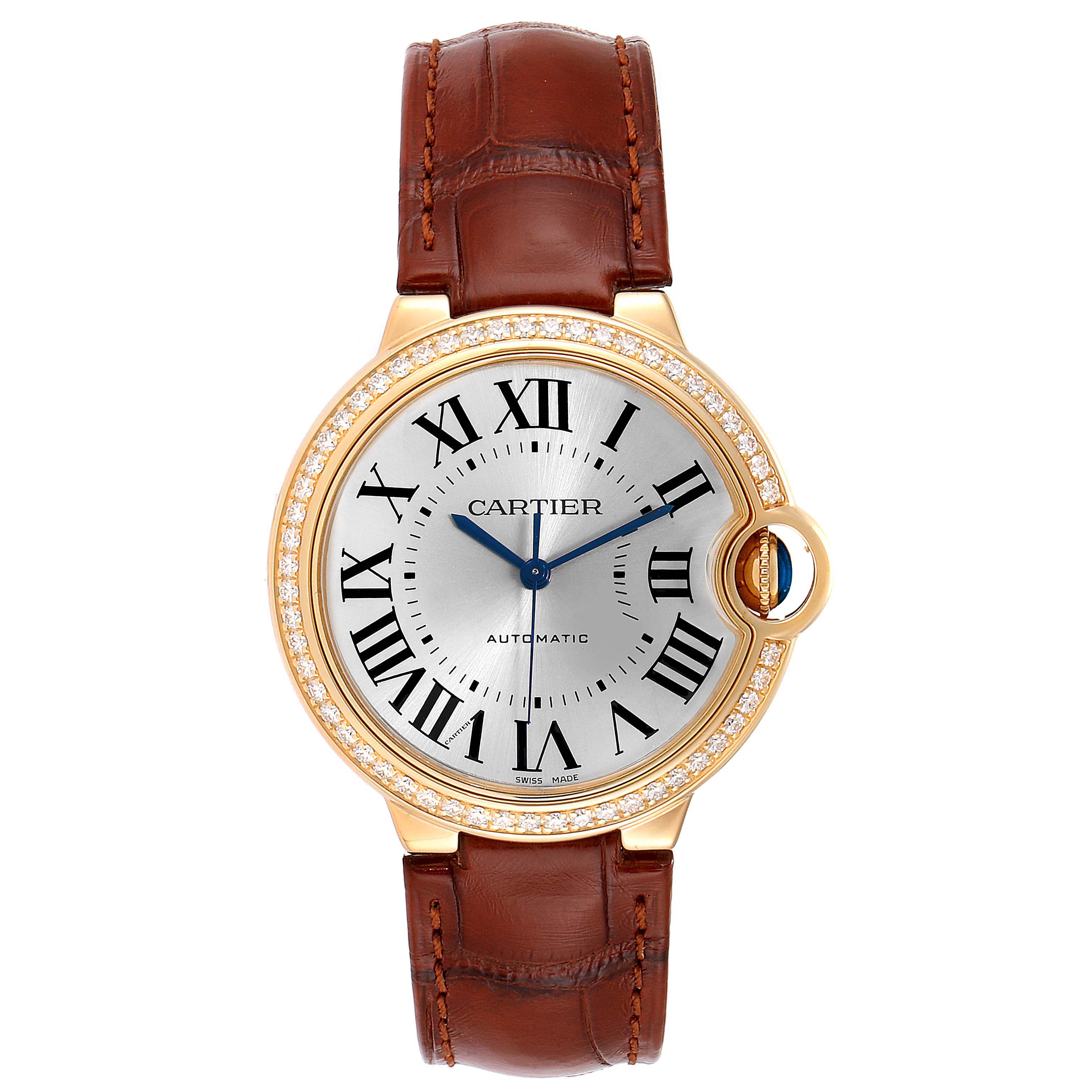 This is a front view of a Cartier Ballon Bleu WE900451 Women's Yellow Gold Silver Dial WE900451 Women's Yellow Gold Silver Dial watch showing the face, leather strap, and diamond-encrusted bezel.