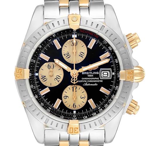 The image shows the Breitling Chronomat B13356 Men's Steel and Gold (two tone) Black Dial B13356 Men's Steel and Gold (two tone) Black Dial watch face-on, highlighting its bezel, dial, subdials, crown, and bracelet.
