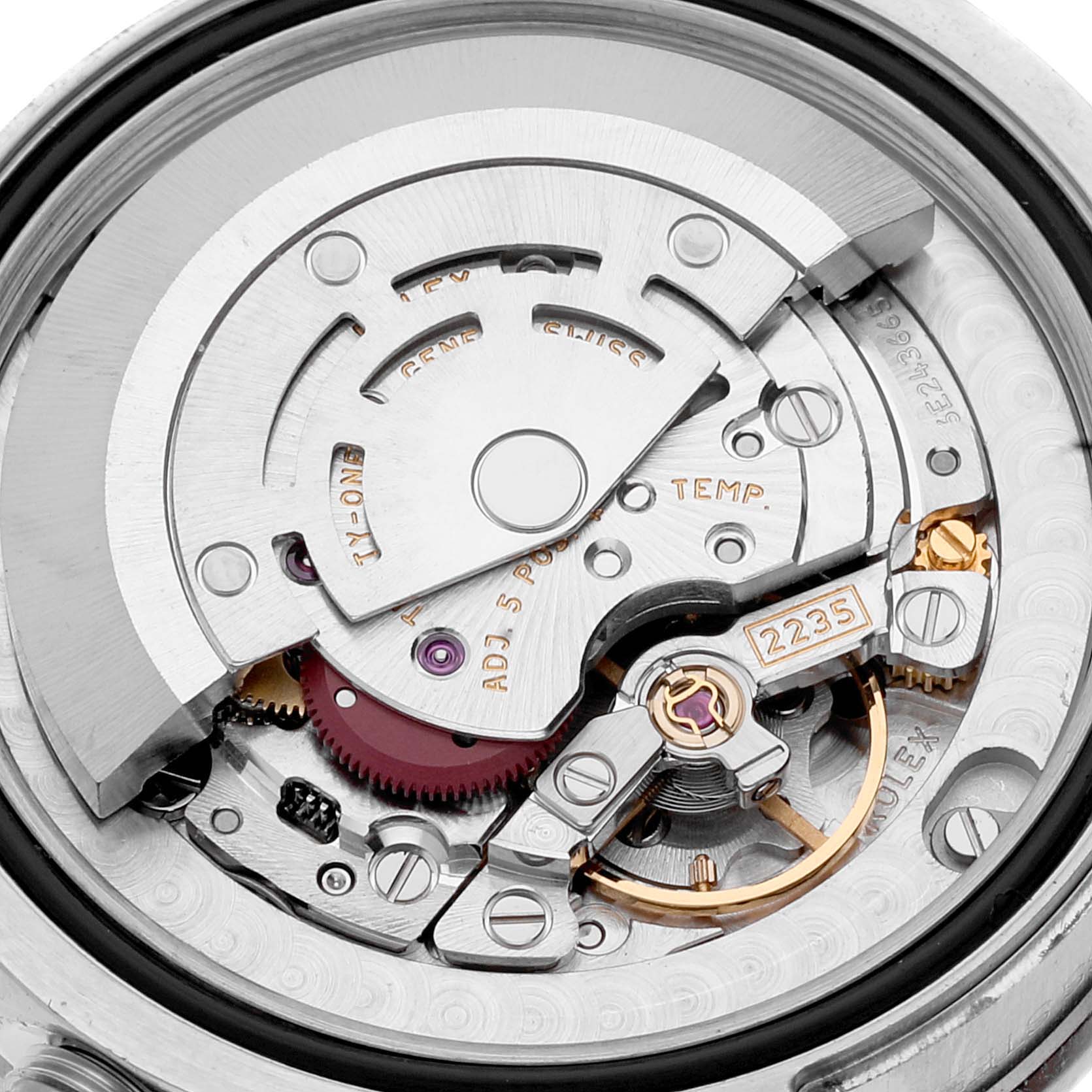 This close-up image shows the inner mechanical movement of a Mid-Size Rolex watch.