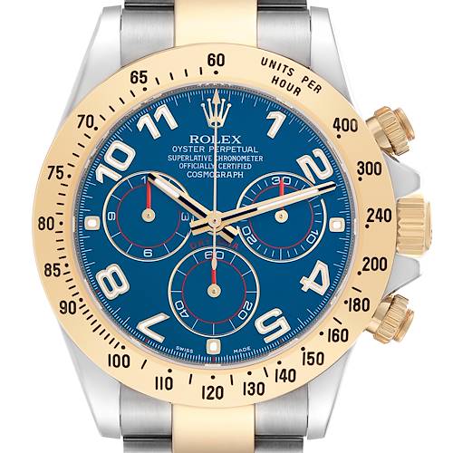The Rolex Daytona 116523 Men's Steel and Gold (two tone) Blue Dial 116523 Men's Steel and Gold (two tone) Blue Dial watch is shown from the front, displaying the blue dial, bezel, subdials, and part of the band.