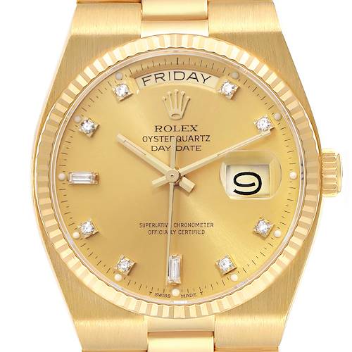 The Rolex Oysterquartz 19018 Men's Yellow Gold Champagne Dial 19018 Men's Yellow Gold Champagne Dial watch is shown from a frontal angle, highlighting the dial, day-date display, and part of the bracelet.