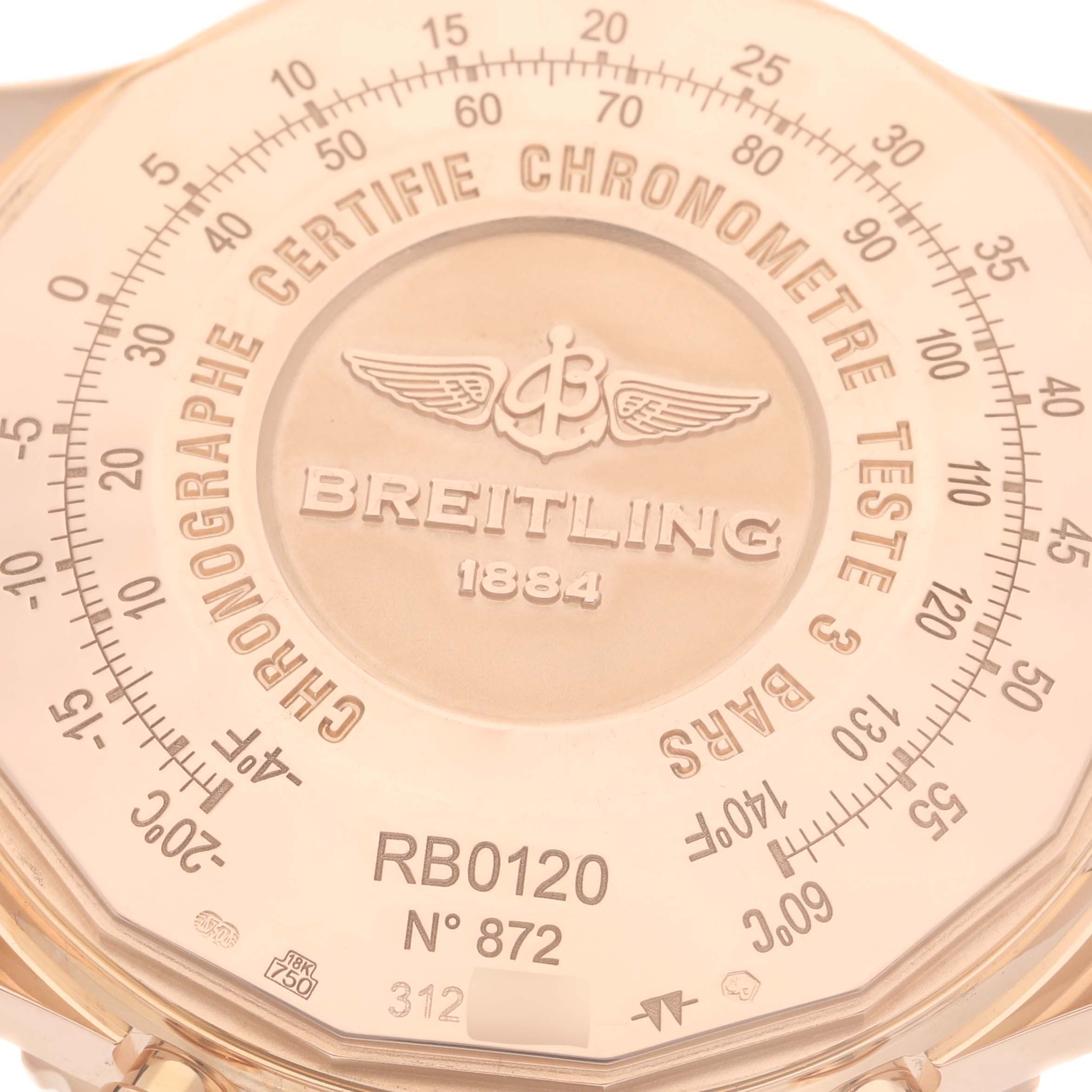 This image shows the case back of a Breitling Navitimer RB0120 Men's Rose Gold Black Dial RB0120 Men's Rose Gold Black Dial model, displaying detailed engravings and serial numbers.