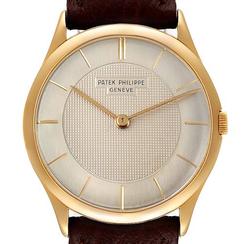 The image shows a front view of a Patek Philippe Calatrava 2507 Men's Yellow Gold Silver Dial 2507 Men's Yellow Gold Silver Dial watch, highlighting its dial, hands, and crown.