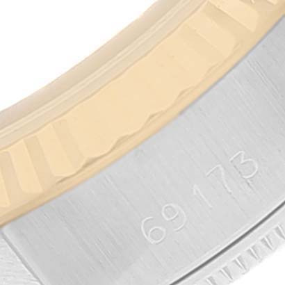 The image shows a close-up of the bezel and part of the casing near the serial number 69173 on a Rolex Datejust 69173 Women's Steel and Gold (two tone) White Dial 69173 Women's Steel and Gold (two tone) White Dial watch.