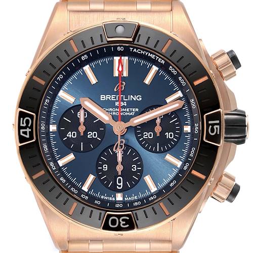 The Breitling Chronomat RB0136 Men's Rose Gold Blue Dial RB0136 Men's Rose Gold Blue Dial watch is shown from a front angle, displaying its face, subdials, bezel, and crown.