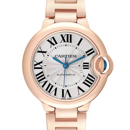 The Cartier Ballon Bleu W6920096 Women's Rose Gold Red Dial W6920096 Women's Rose Gold Red Dial watch is shown from a front view, highlighting the dial, Roman numerals, hands, and crown.