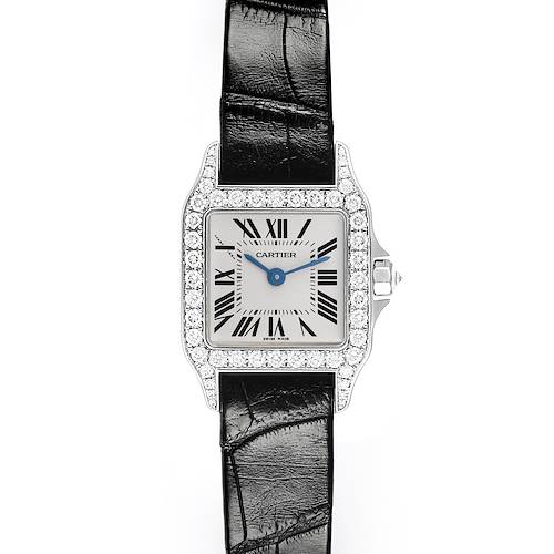 The Cartier Santos Demoiselle WF9005Y8 Women's White Gold Silver Dial WF9005Y8 Women's White Gold Silver Dial watch is shown from a frontal angle, featuring its diamond-set bezel and black leather strap.