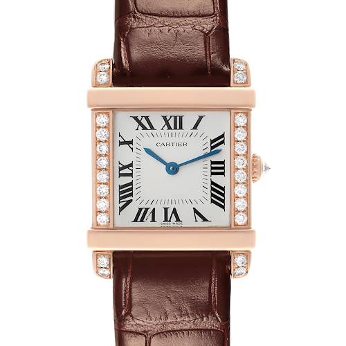 The Tank Louis by Cartier is shown from a top view, highlighting its face, Roman numerals, diamond-studded bezel, and brown leather strap.