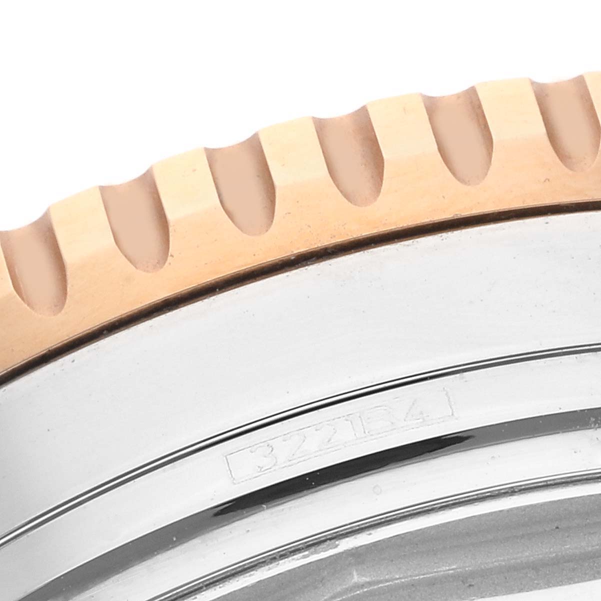This image shows a close-up of the bezel and part of the case of a Breitling Navitimer U13324211B1X1 Men's Steel and Gold (two tone) Black Dial U13324211B1X1 Men's Steel and Gold (two tone) Black Dial watch.