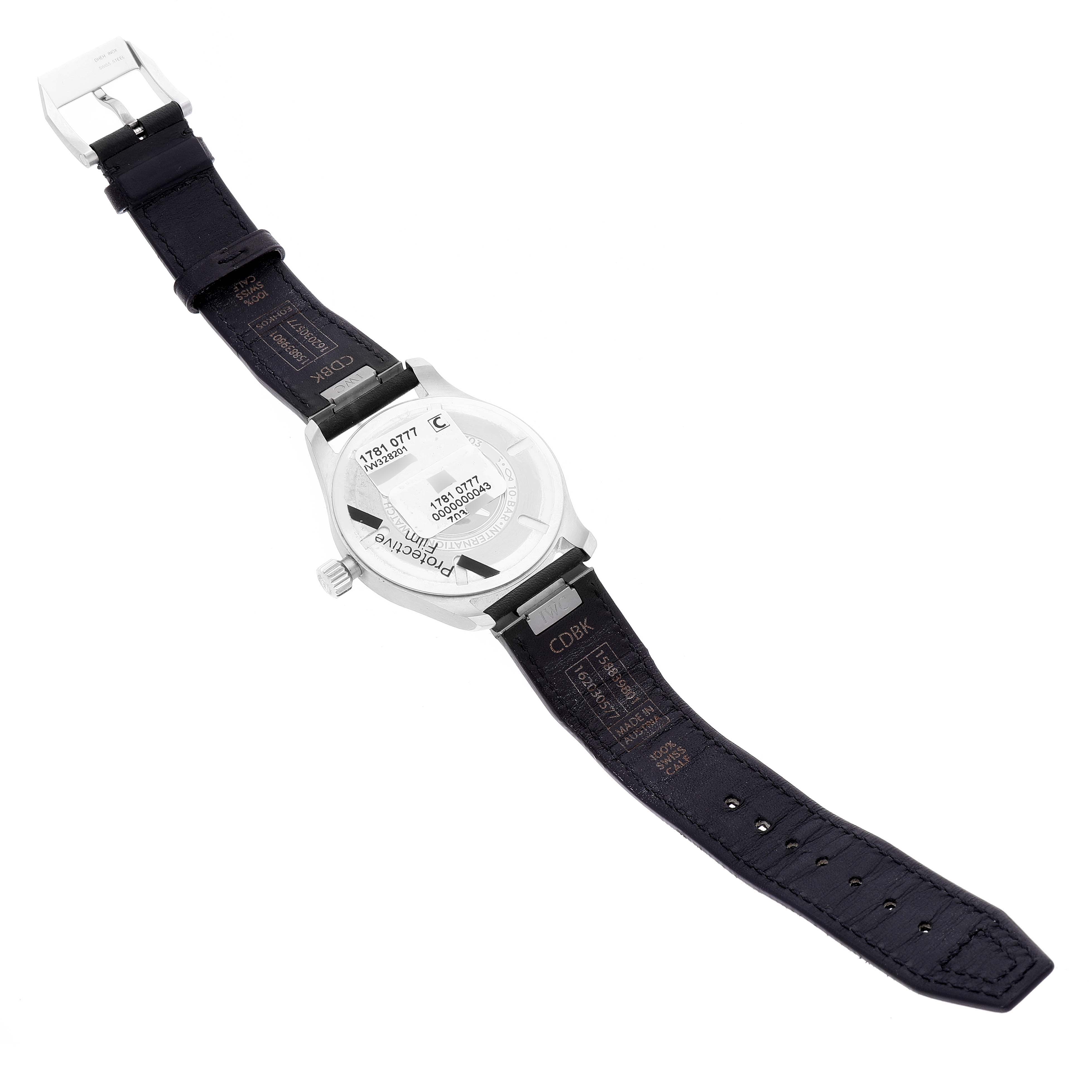 This image shows the back of an IWC Pilot IW328201 Men's Stainless Steel Black Dial IW328201 Men's Stainless Steel Black Dial watch laid flat, highlighting its case back, strap, and buckle.