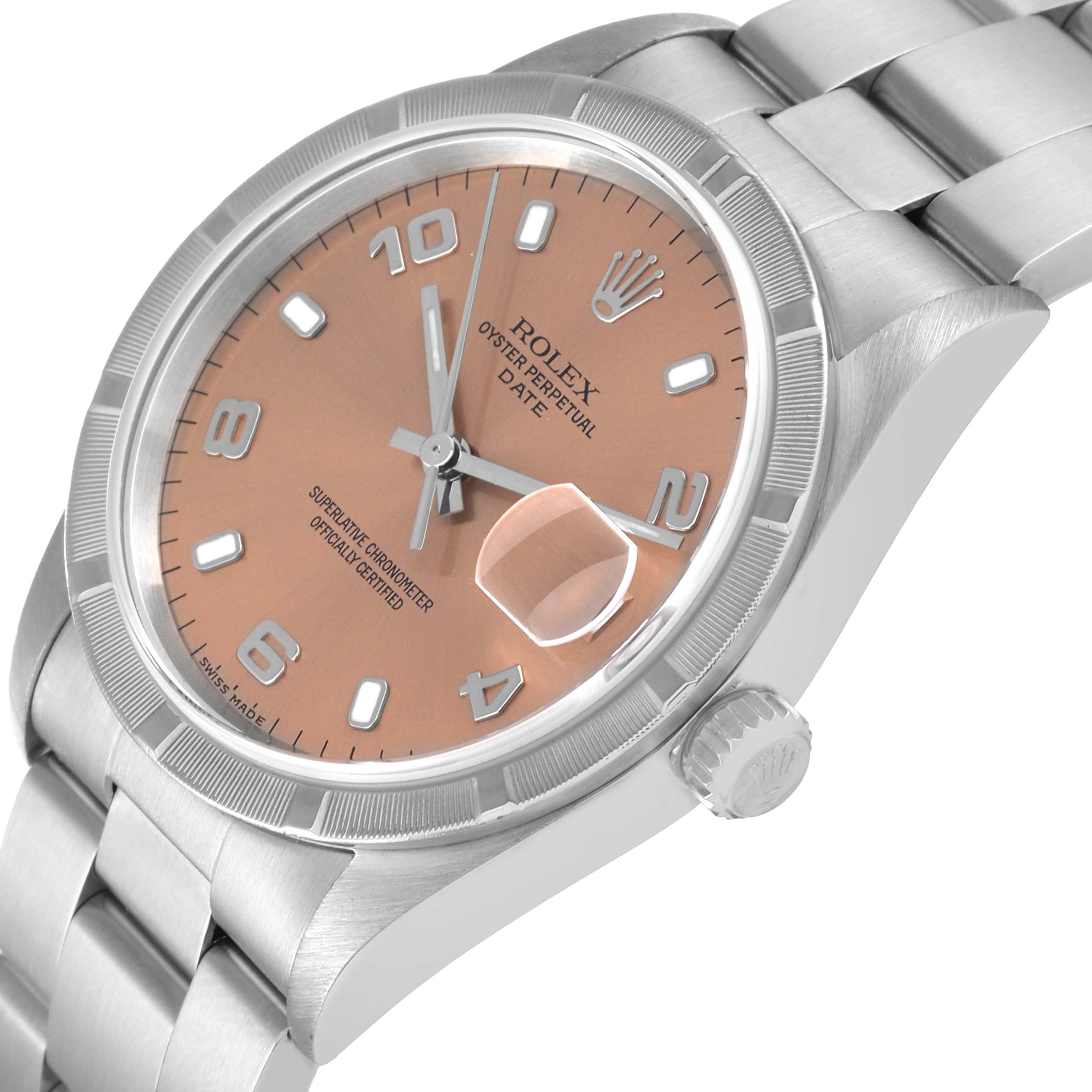 The image shows a Rolex Date 15210 Men's Stainless Steel Pink Dial 15210 Men's Stainless Steel Pink Dial model watch at an angled close-up, highlighting the dial, crown, and part of the bracelet.