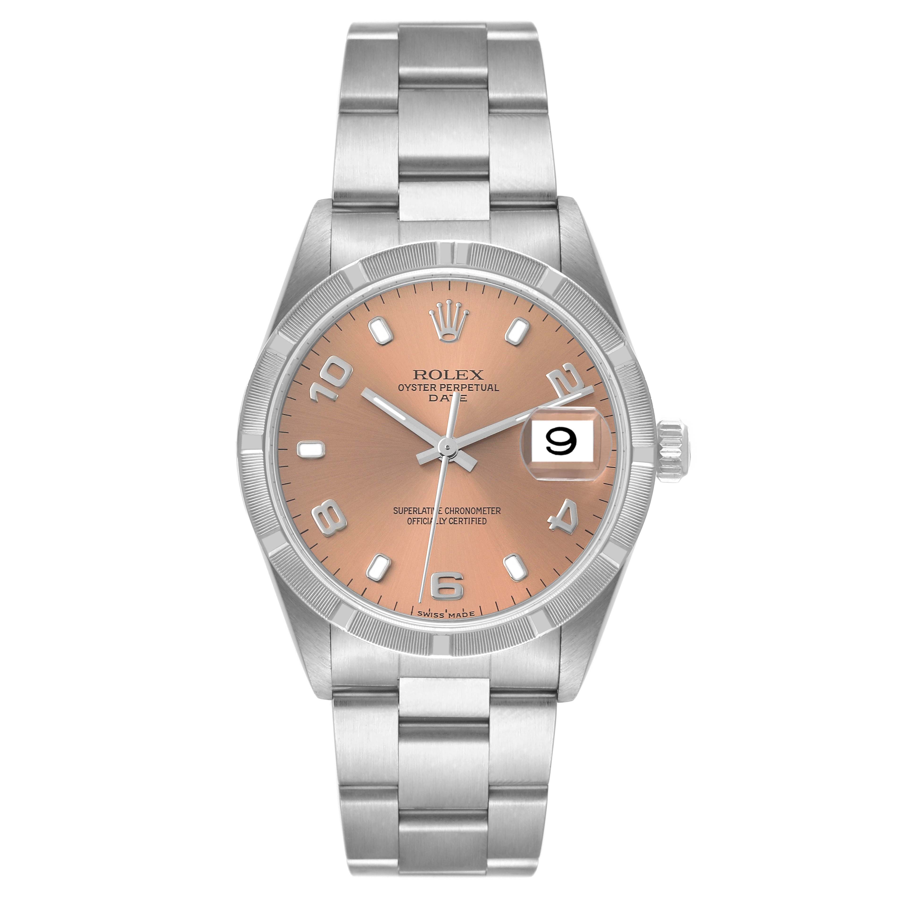 The image shows a front view of a Rolex Oyster Perpetual Date watch with a silver bracelet and a salmon-colored dial with a date window at 3 o'clock.