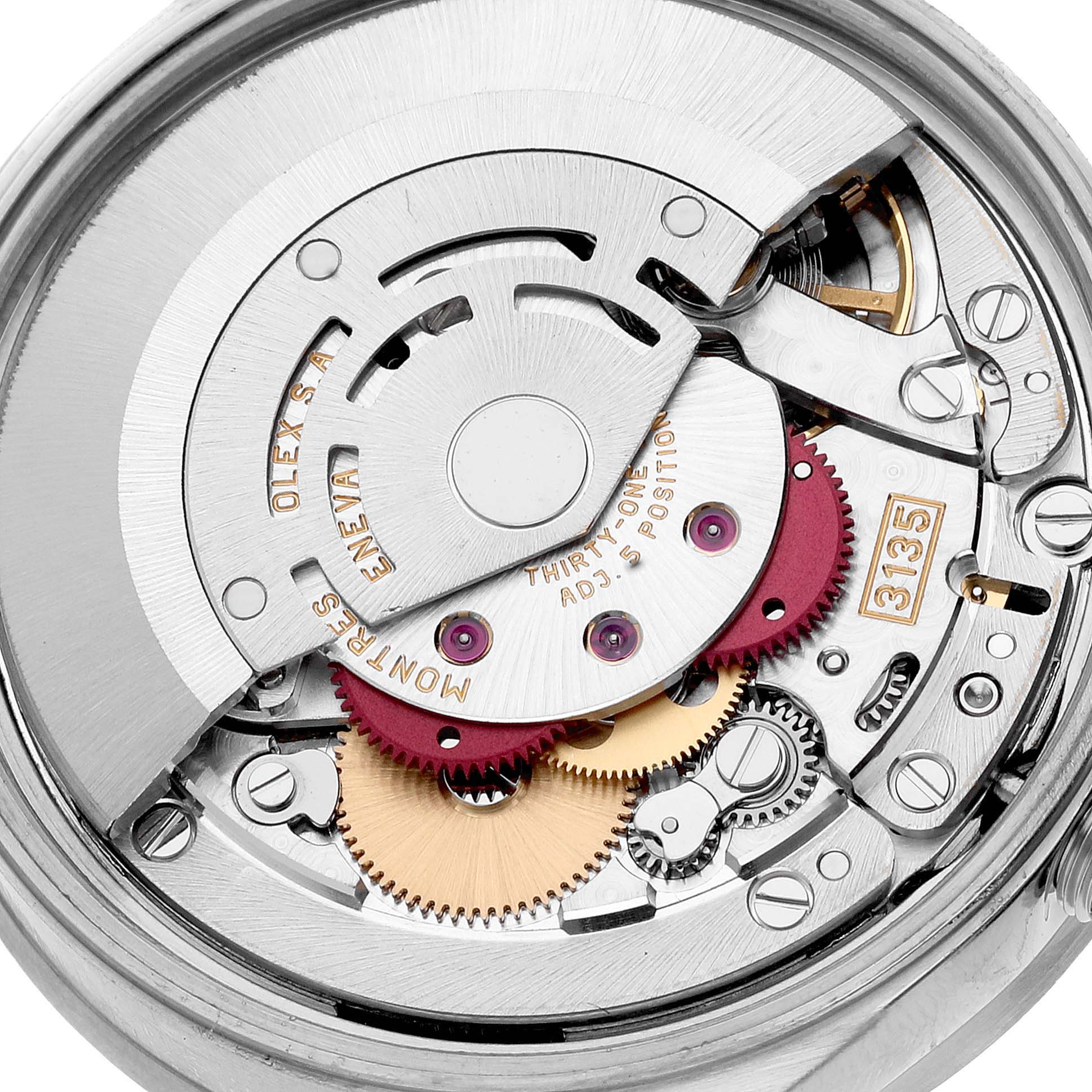 This is a close-up shot of the movement inside a Rolex Date 15210 Men's Stainless Steel Pink Dial 15210 Men's Stainless Steel Pink Dial model watch, showcasing its intricate gears and components.