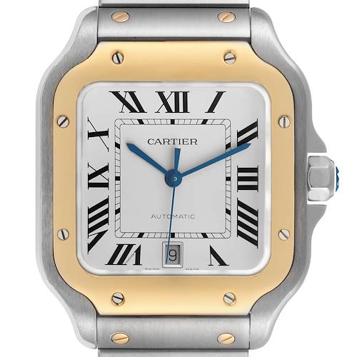 The Cartier Santos W2SA0009 Men's Steel and Gold (two tone) Silver Dial W2SA0009 Men's Steel and Gold (two tone) Silver Dial watch is shown from a front angle, highlighting the dial, bezel, and part of the bracelet.