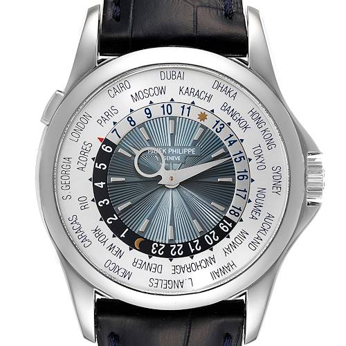 The image shows a top-down view of the Patek Philippe Complications 5130P-001 Men's Platinum Silver Dial 5130P-001 Men's Platinum Silver Dial watch, highlighting the dial and world time zones.