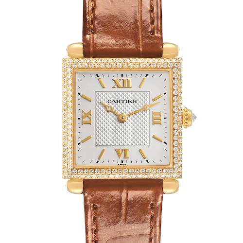 The Cartier Tank Obus WB800351 Women's Yellow Gold Silver Dial WB800351 Women's Yellow Gold Silver Dial watch is shown from the front, highlighting its leather strap, square dial, and diamond-accented bezel.