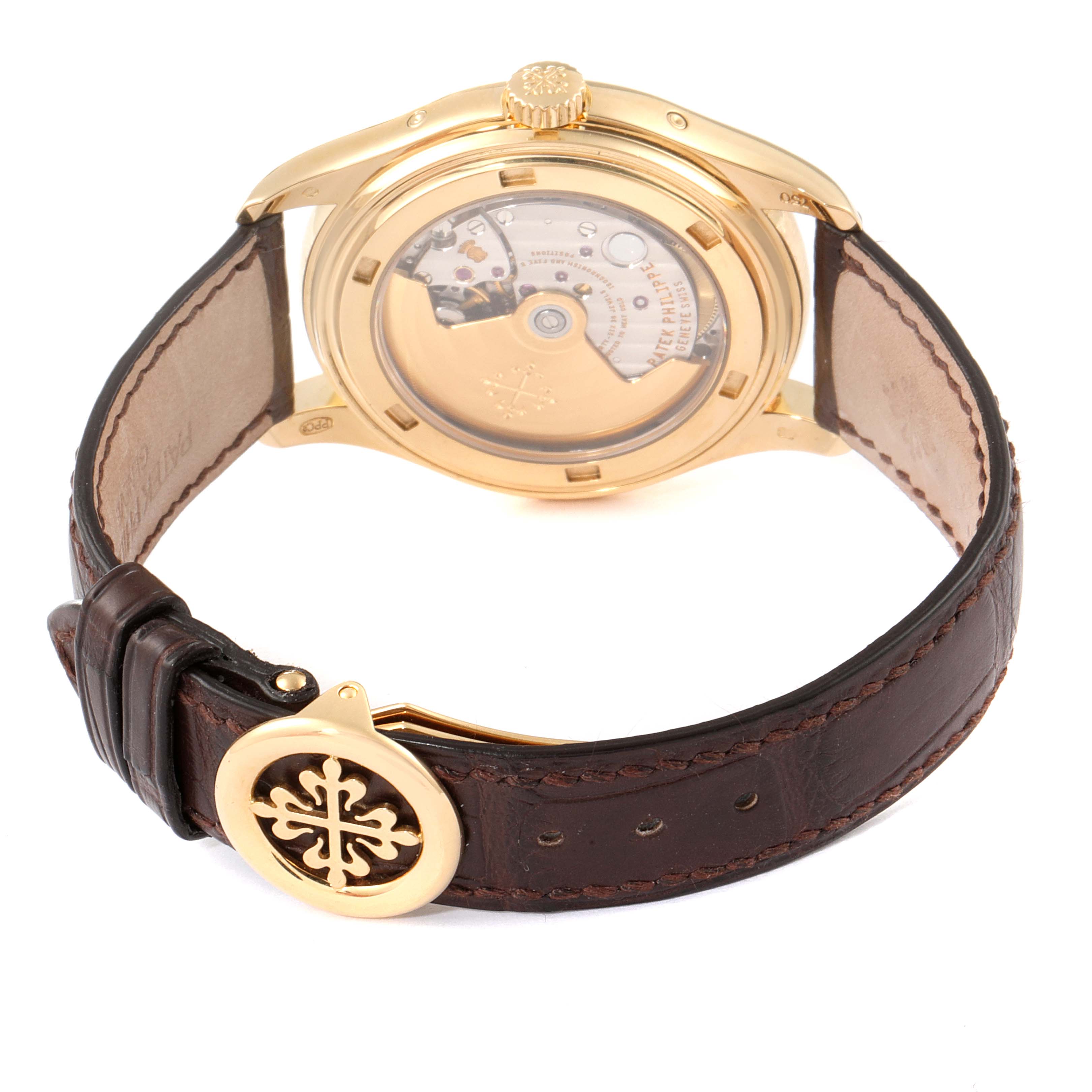 This image shows the back view and part of the brown leather strap of the Patek Philippe 5146J - 01D Men's Yellow Gold Grey Dial 5146J - 01D Men's Yellow Gold Grey Dial Complicated Annual Calendar Yellow Gold Mens Watch 5146.