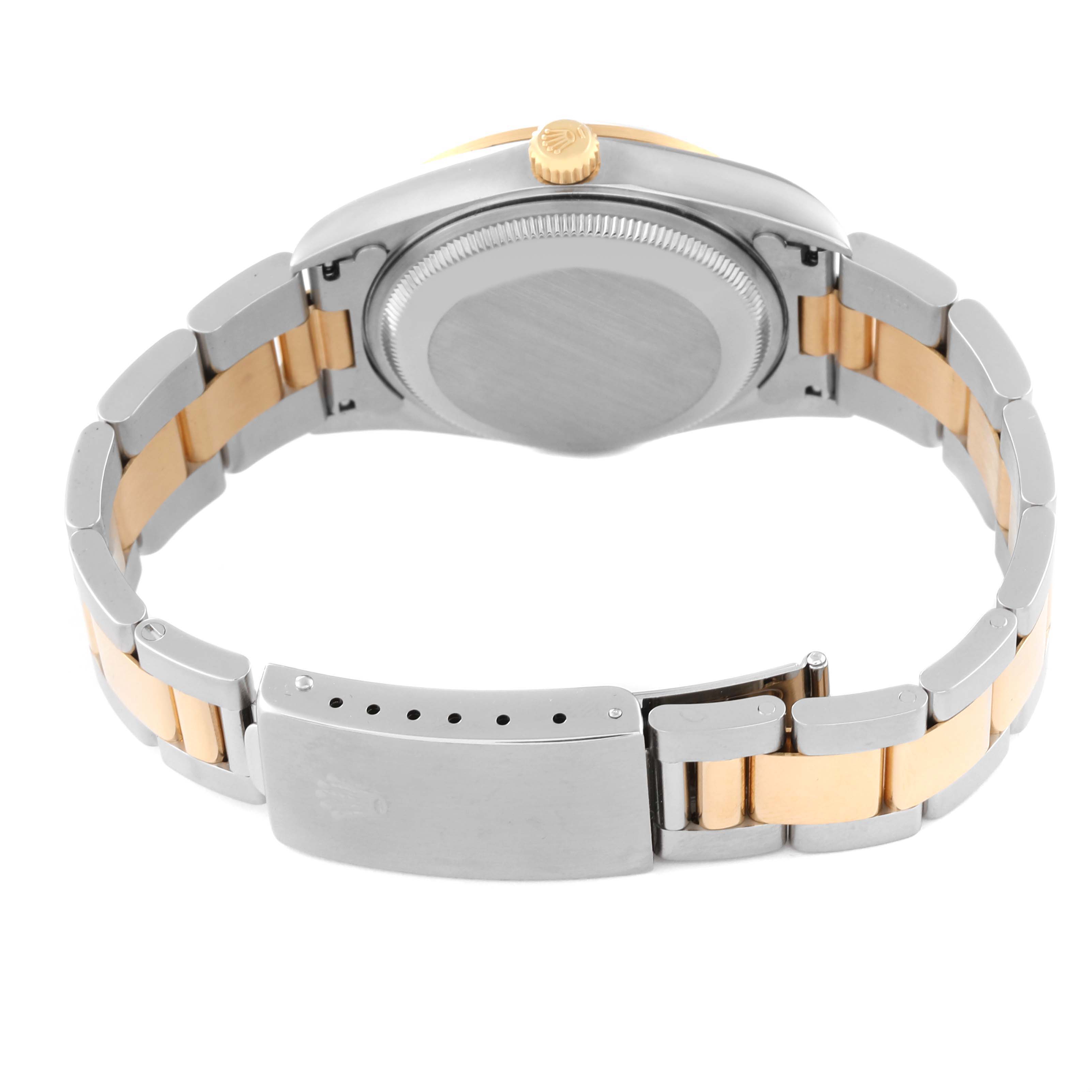 This image shows the back case and bracelet of the Rolex Date 15203 Men's Steel and Gold (two tone) Blue Dial 15203 Men's Steel and Gold (two tone) Blue Dial model watch from a rear angle.