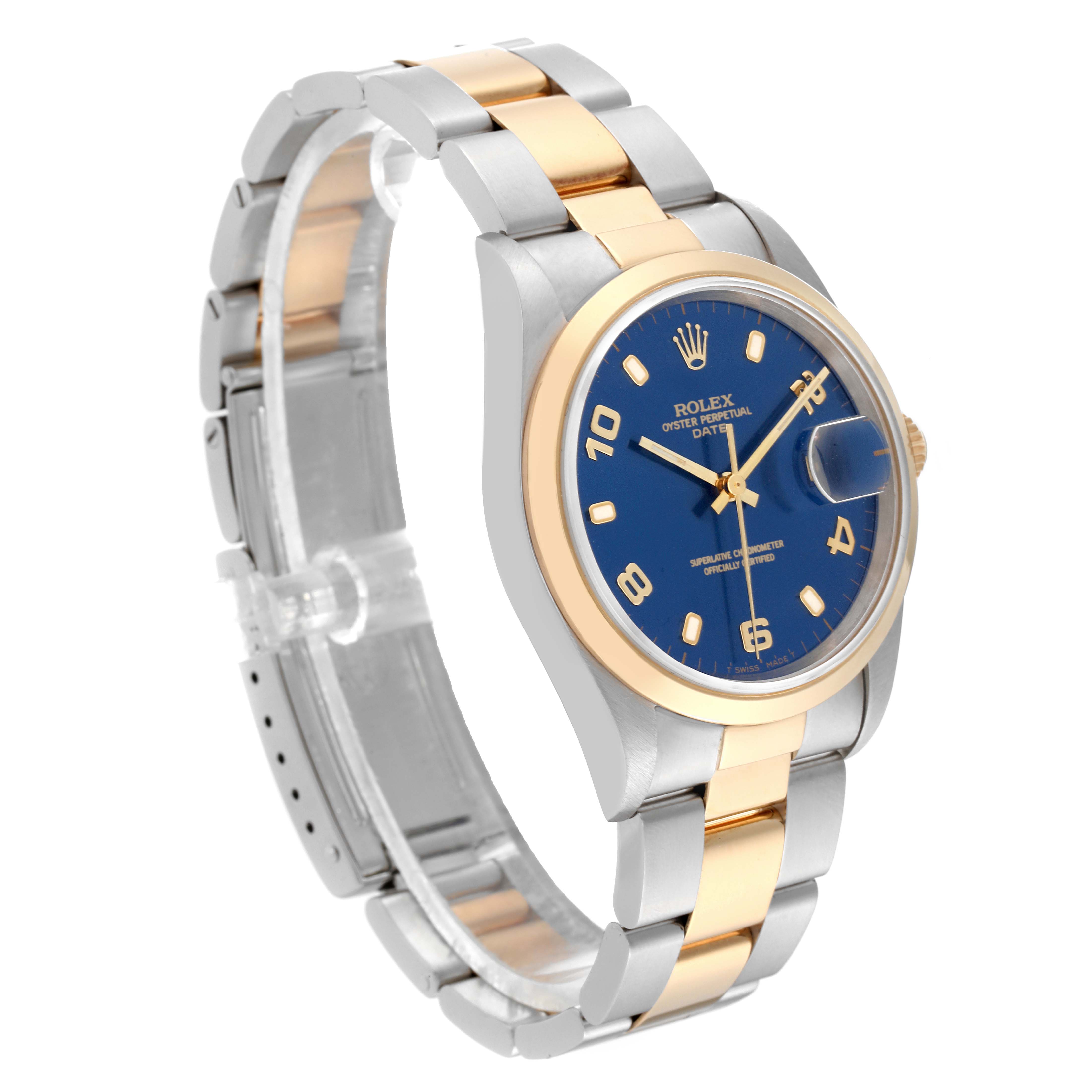 This image shows a side view of the Rolex Date 15203 Men's Steel and Gold (two tone) Blue Dial 15203 Men's Steel and Gold (two tone) Blue Dial model, highlighting the blue dial, two-tone bracelet, bezel, and crown.