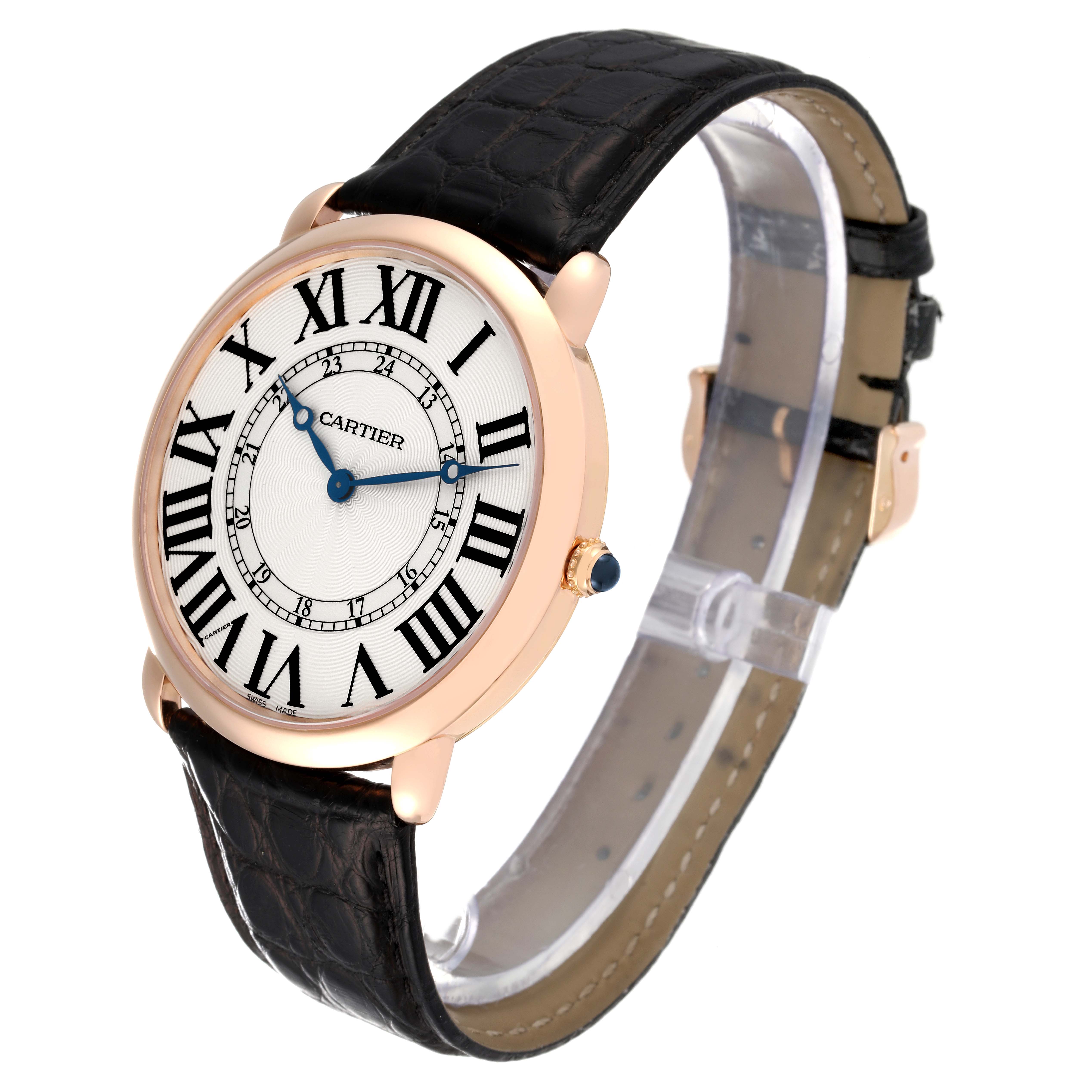 This image shows a Cartier Ronde W6801004 Men's Rose Gold Silver Dial W6801004 Men's Rose Gold Silver Dial model watch from an angled side view, highlighting the face, case, and leather strap.