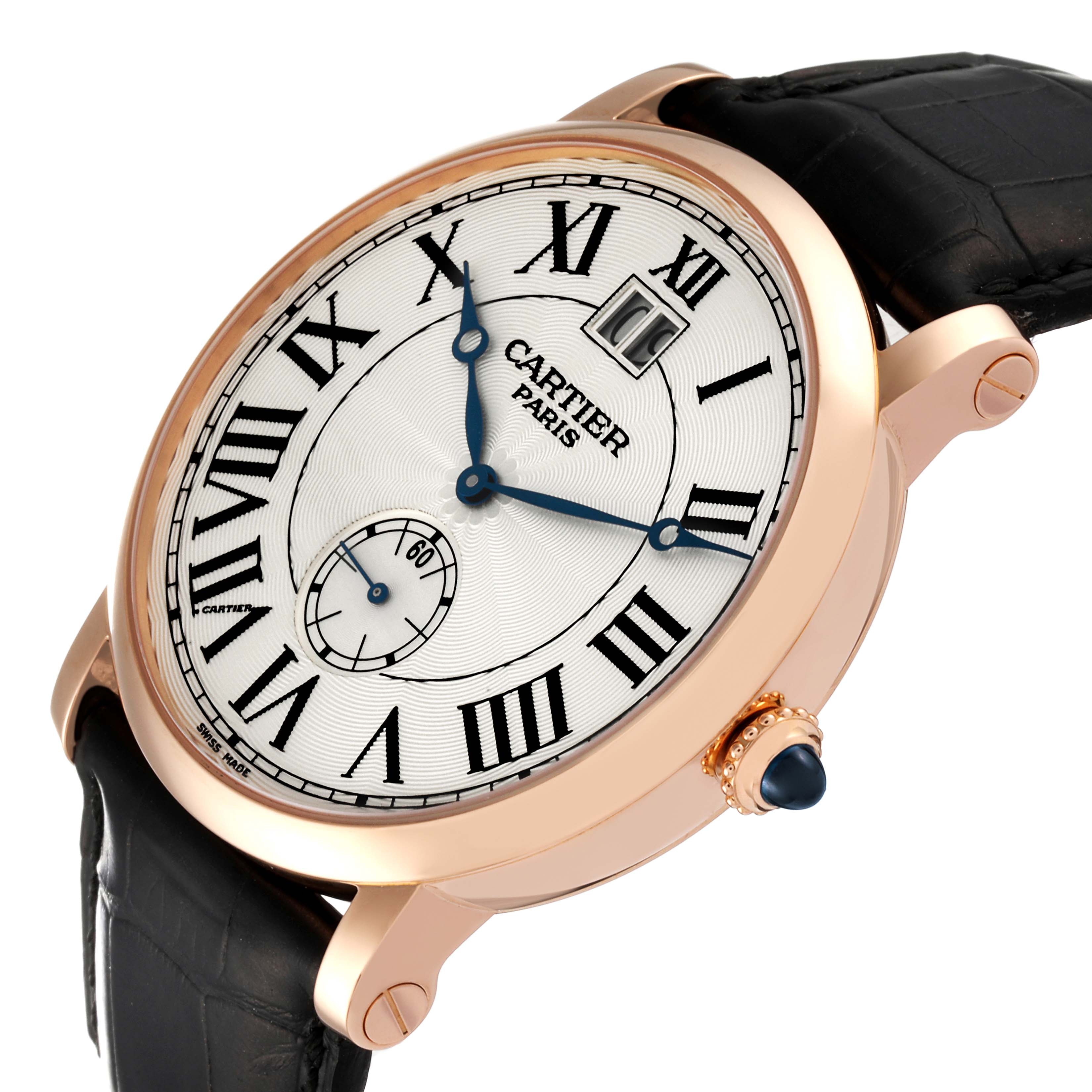 The image shows a close-up view of the dial, crown, and strap of the Rotonde de Cartier watch.