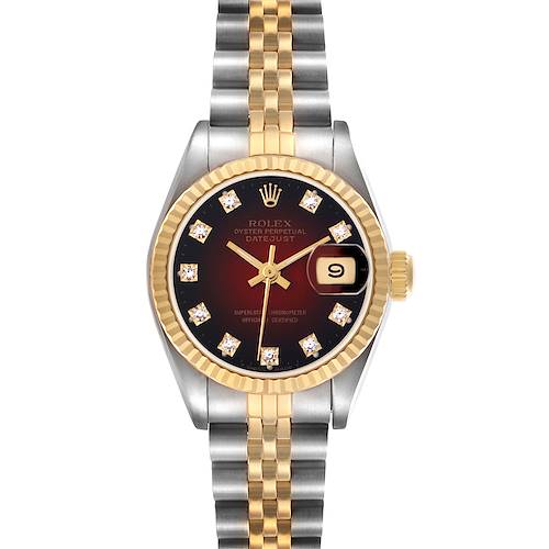 The Rolex Datejust 69173 Women's Steel and Gold (two tone) Red Dial 69173 Women's Steel and Gold (two tone) Red Dial watch is shown from a top-down angle, highlighting the dial, fluted bezel, and two-tone bracelet.