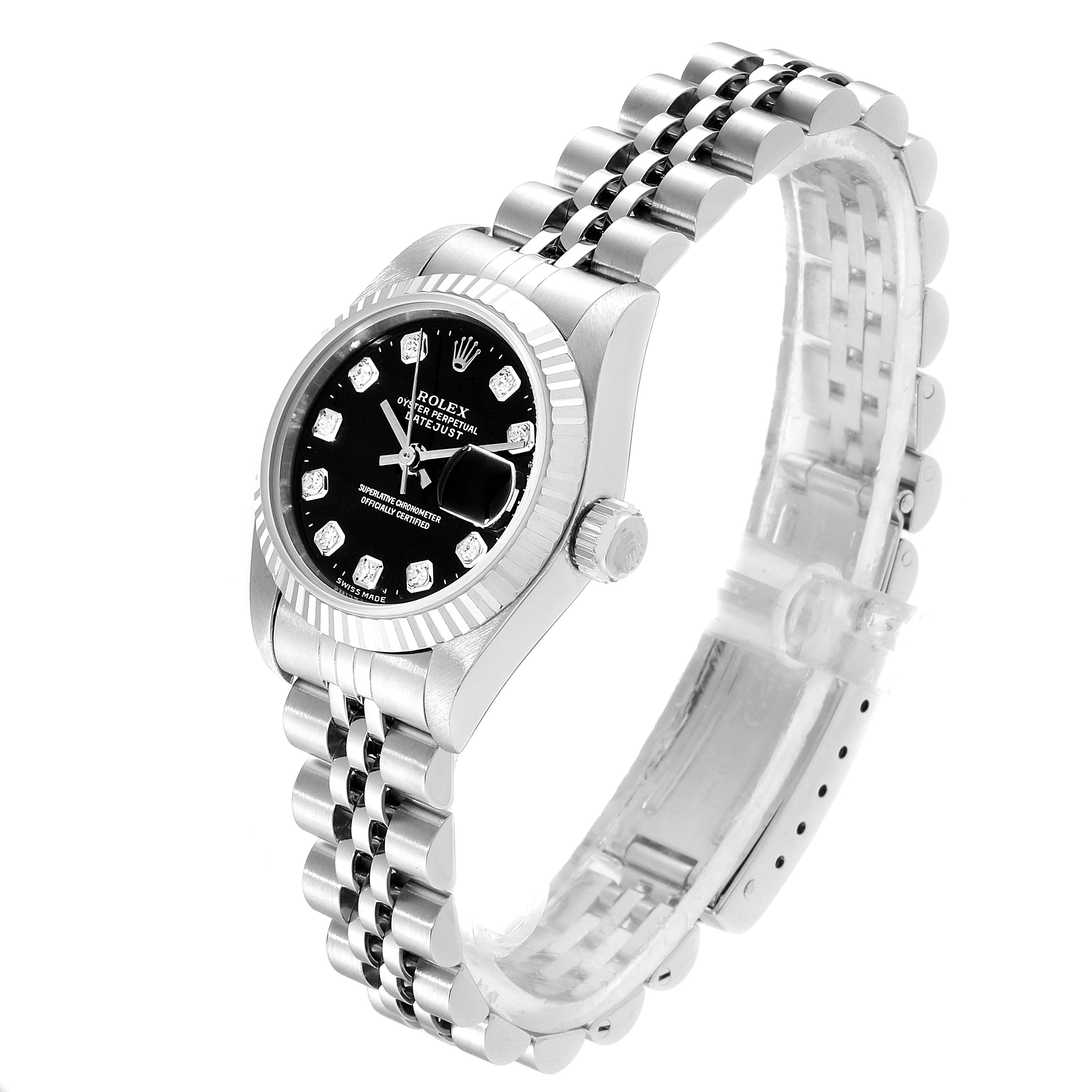 The image shows a Rolex Datejust 69174 Women's Stainless Steel Black Dial 69174 Women's Stainless Steel Black Dial watch from a three-quarter angle, featuring its Jubilee bracelet, fluted bezel, and black dial with diamond hour markers.