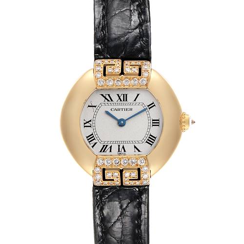The Cartier Tortue WB600851 Women's Yellow Gold Silver Dial WB600851 Women's Yellow Gold Silver Dial watch is shown from a top-down angle, displaying the dial, case, and part of the strap.