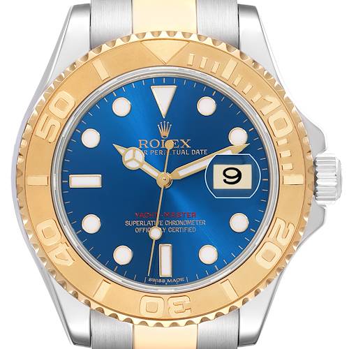 The Rolex Yacht-Master 16623 Men's Steel and Gold (two tone) Blue Dial 16623 Men's Steel and Gold (two tone) Blue Dial watch is shown from a front angle, featuring its blue dial, gold bezel, and date display.