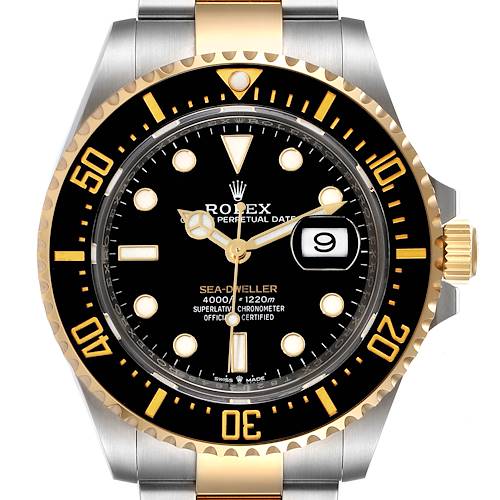 This is a frontal view of the Rolex Sea-Dweller 126603 Men's Steel and Gold (two tone) Black Dial 126603 Men's Steel and Gold (two tone) Black Dial watch, showing the black dial, golden bezel, date window, and part of the two-tone bracelet.