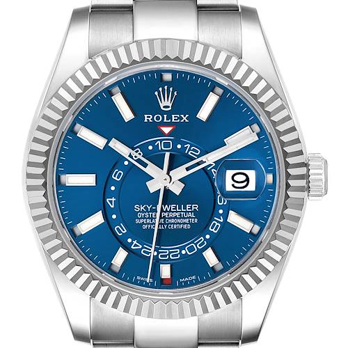 The Rolex Sky-Dweller 326934 Men's Stainless Steel Blue Dial 326934 Men's Stainless Steel Blue Dial watch is shown from a front angle, highlighting its blue dial, fluted bezel, and date display.