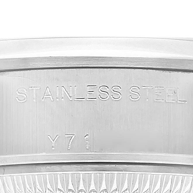 This image shows a close-up of the stainless steel case back of a Rolex Date 79160 Women's Stainless Steel White Dial 79160 Women's Stainless Steel White Dial model watch.