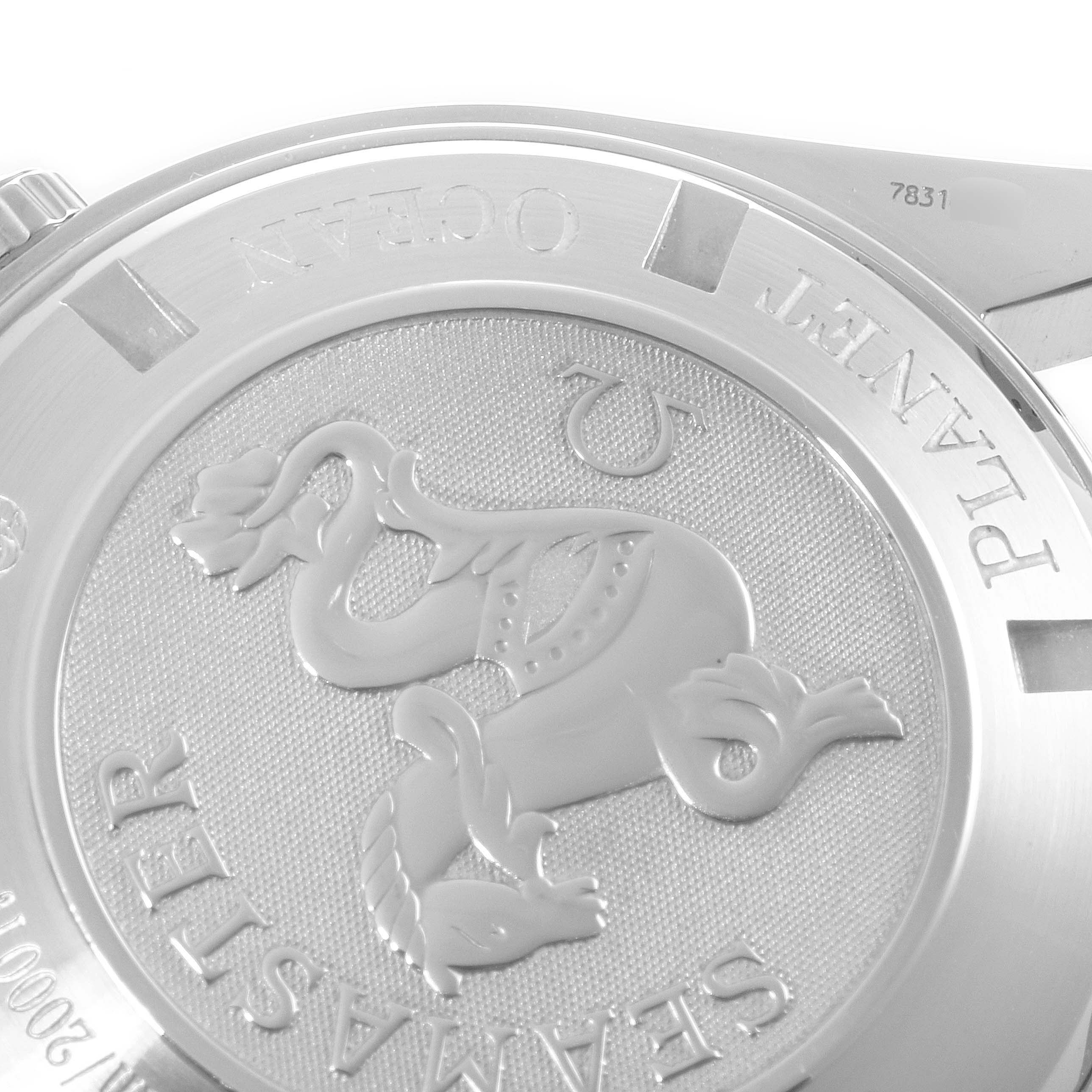 The image shows the back case of an Omega Planet Ocean 2218.50.00 Men's Stainless Steel Black Dial 2218.50.00 Men's Stainless Steel Black Dial watch, displaying the Seamaster logo and inscriptions.