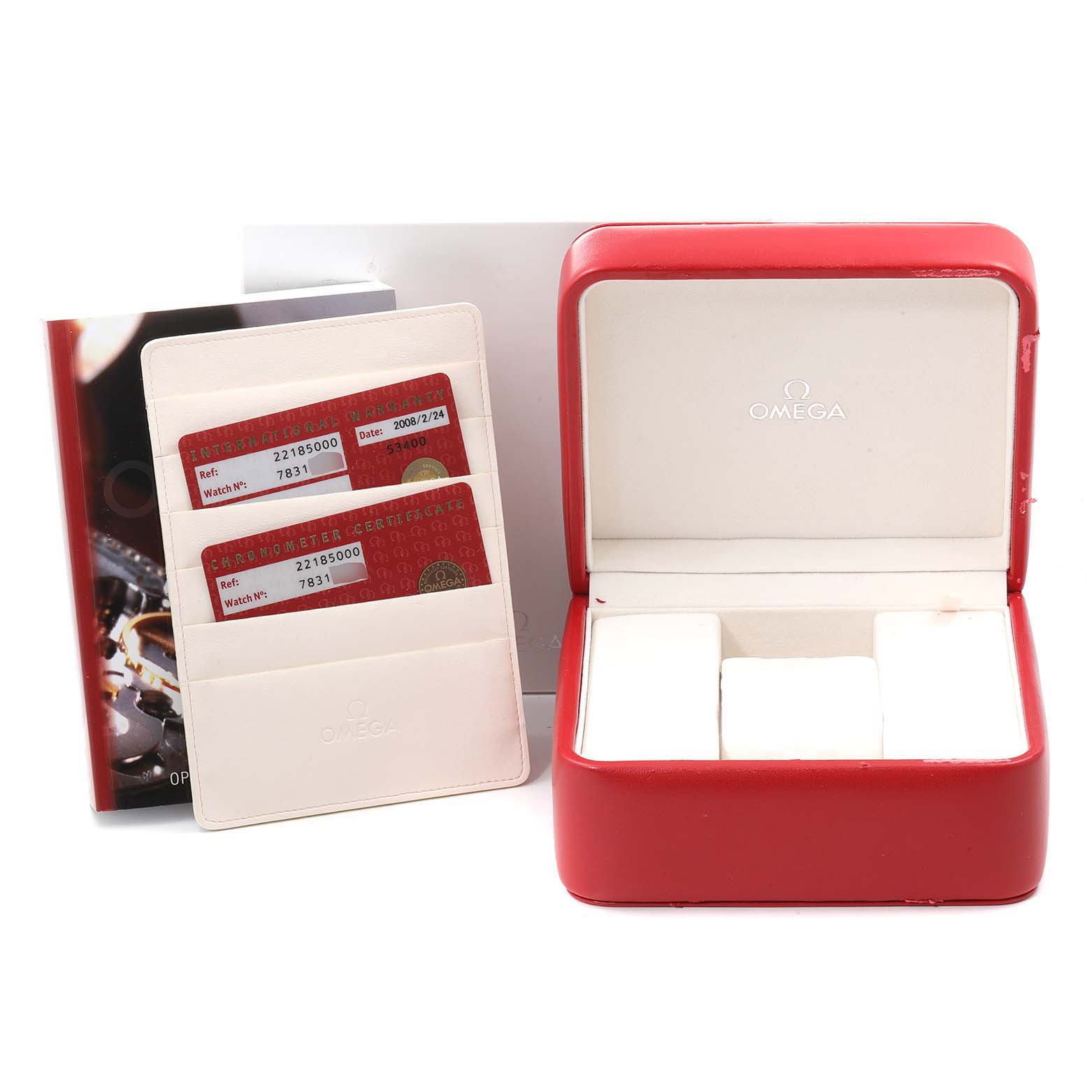 This image shows the accessories for an Omega Planet Ocean 2218.50.00 Men's Stainless Steel Black Dial 2218.50.00 Men's Stainless Steel Black Dial watch, including the box, manuals, and certification cards.