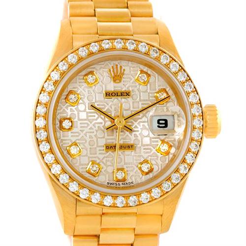 The image shows a front view of a Rolex President 69138 Women's Yellow Gold Beige Dial 69138 Women's Yellow Gold Beige Dial model watch, highlighting its diamond bezel, bracelet, dial, and date display.