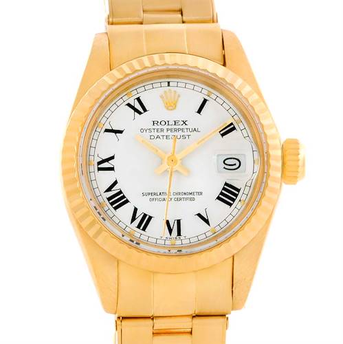 This image shows a front view of a Rolex President 6917 Women's Yellow Gold White Dial 6917 Women's Yellow Gold White Dial Datejust watch, displaying its face, bezel, and parts of the bracelet.