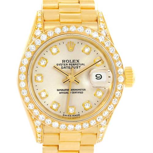The image shows a front view of a Rolex President 69158 Women's Yellow Gold Silver Dial 69158 Women's Yellow Gold Silver Dial model watch, highlighting its gold case, diamond bezel, and dial with date display.
