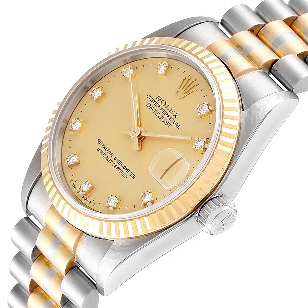 This image shows a Rolex President 68279 Women's White Gold Champagne Dial 68279 Women's White Gold Champagne Dial model watch from an angled close-up, highlighting its dial, crown, bezel, and bracelet.