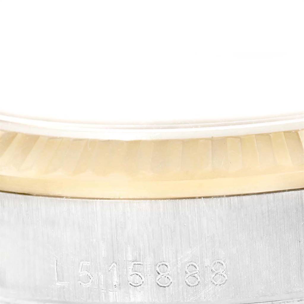 The image shows a close-up of the case and bezel with part of the serial number on a Rolex President 68279 Women's White Gold Champagne Dial 68279 Women's White Gold Champagne Dial model watch.