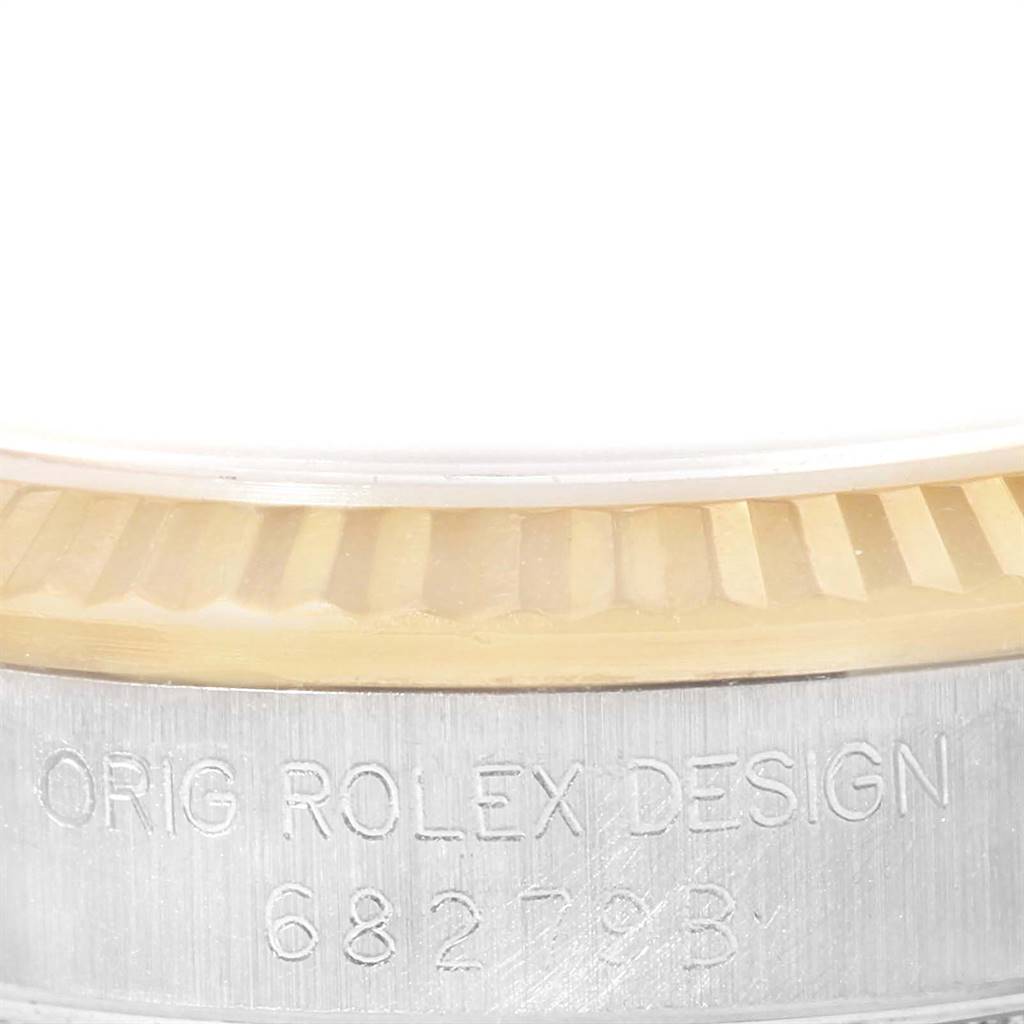 This image shows a close-up of the case side engraving of a Rolex President 68279 Women's White Gold Champagne Dial 68279 Women's White Gold Champagne Dial watch, revealing the model number 68279B.