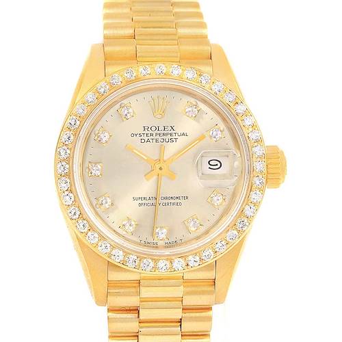 This image shows a frontal view of a gold Rolex President 69138 Women's Yellow Gold Silver Dial 69138 Women's Yellow Gold Silver Dial Datejust watch, featuring a diamond bezel and dial markers.