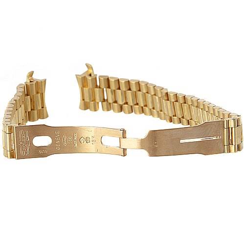 The image shows a gold bracelet of the Rolex President 69068 Women's Yellow Gold Mother of Pearl Dial 69068 Women's Yellow Gold Mother of Pearl Dial model from a top angle, displaying the clasp and links.